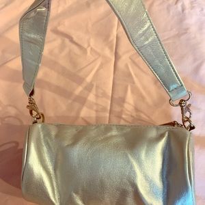 Small silver leather roll purse mint condition.